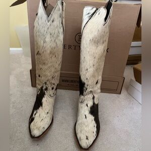 Liberty Black hair on tall blanco cafe cowhide boots